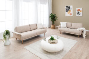 Skagen Studio Riis dining chair in Antwerp Beige fabric.