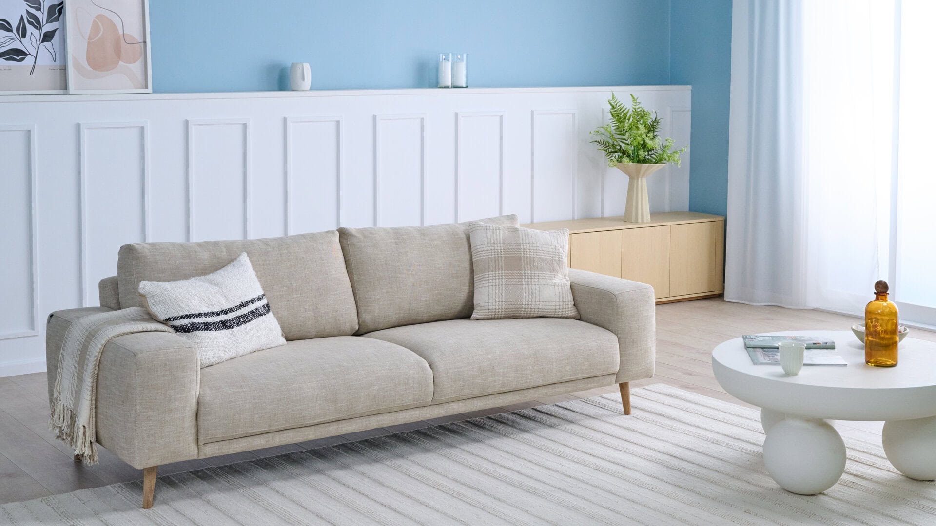 Skagen Studio Riis dining chair in Antwerp Beige fabric.