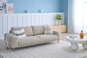 Skagen Studio Riis dining chair in Antwerp Beige fabric.