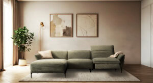 Skagen Studio Funen sofa in olive fabric, in a warm-toned living room, seen from the side.